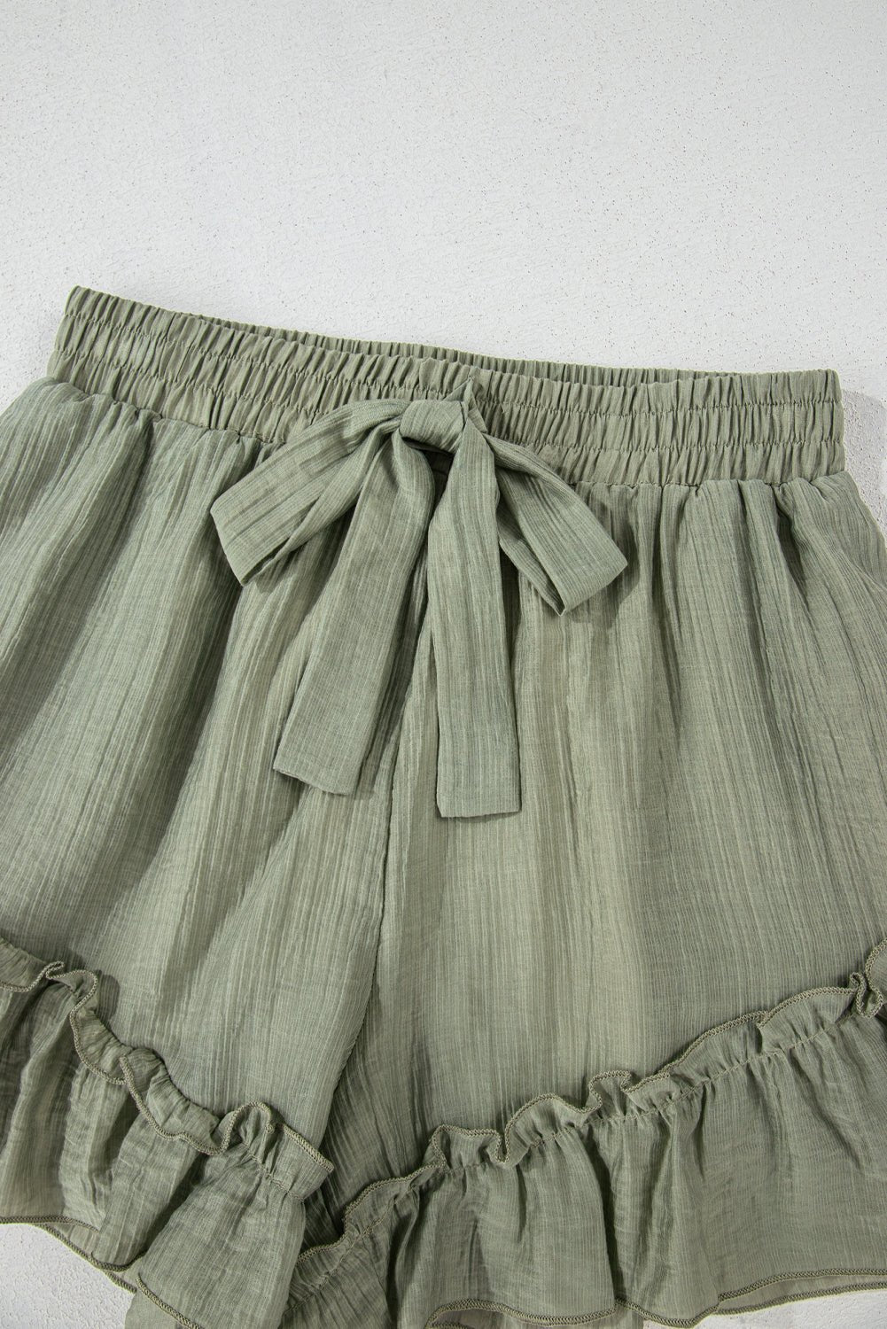 Laurel Green Textured Tie Waist Ruffle Hem Shorts - Raelynns&Co