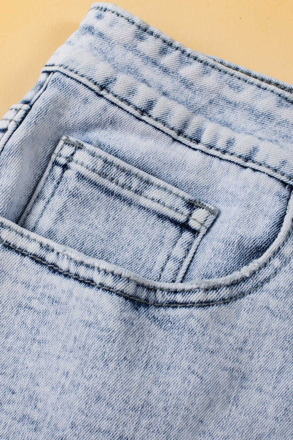 Light Blue Acid Wash Crossed Raw Edge Denim Shorts - Raelynns&Co