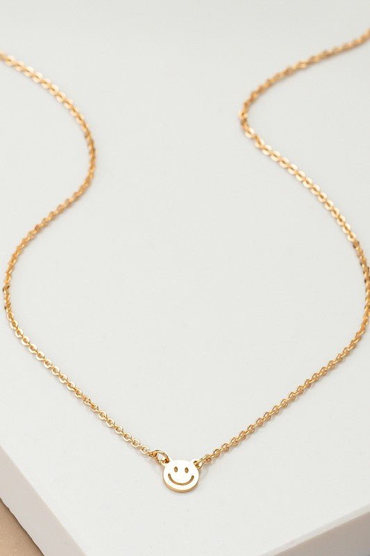 mini smiley face on a delicate chain necklace - RaeLynns Boutique