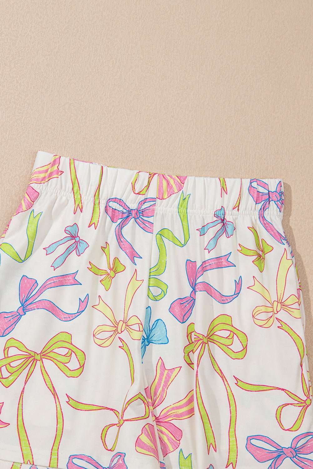 White Cheerful Bow Print Elastic Pull On Casual Shorts - Raelynns&Co